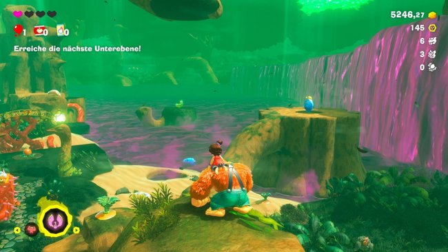 Screenshot aus Donkey Kong Bananza aus einem Wald an einen lila See, Donkey Kong und Pauline im Vordergrund. Screenshot aus Donkey Kong Bananza aus einem Wald an einen lila See, Donkey Kong und Pauline im Vordergrund.