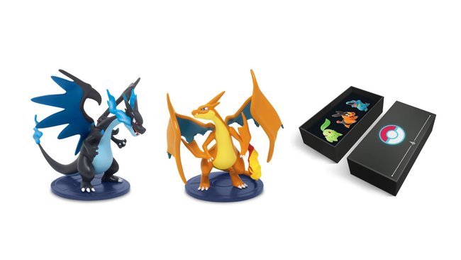 Figuren von Mega-Glurak X und Mega-Glurak Y sowie ein Pin-Set der Starter. Figuren von Mega-Glurak X und Mega-Glurak Y sowie ein Pin-Set der Starter.