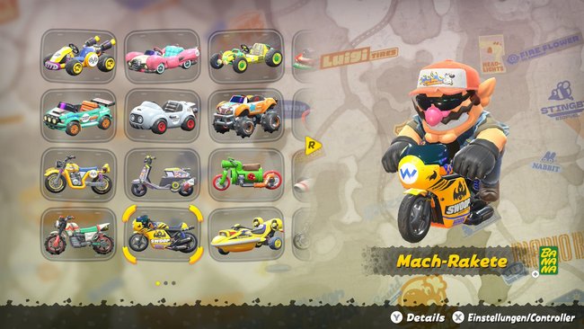 Wario auf der Mach-Rakete in der Charakter-Auswahl von Mario Kart World. Wario auf der Mach-Rakete in der Charakter-Auswahl von Mario Kart World.
