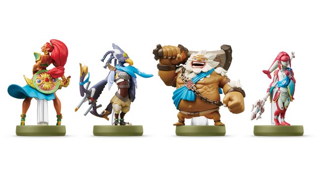 Vier detaillierte Figuren aus der „The Legend of Zelda“-Spielreihe auf grünen Sockeln. Von links nach rechts: Eine weibliche Kriegerin mit rotem Haar, einem Schild und einem Säbel; ein vogelähnlicher Charakter mit blauem Schal und einem Bogen; ein grosser, muskulöser Charakter mit weissem Haar, einem Hammer und einer Kette um die Brust; eine schlanke, fischähnliche Figur in Rot- und Blautönen mit einem Speer. Vier detaillierte Figuren aus der „The Legend of Zelda“-Spielreihe auf grünen Sockeln. Von links nach rechts: Eine weibliche Kriegerin mit rotem Haar, einem Schild und einem Säbel; ein vogelähnlicher Charakter mit blauem Schal und einem Bogen; ein grosser, muskulöser Charakter mit weissem Haar, einem Hammer und einer Kette um die Brust; eine schlanke, fischähnliche Figur in Rot- und Blautönen mit einem Speer.