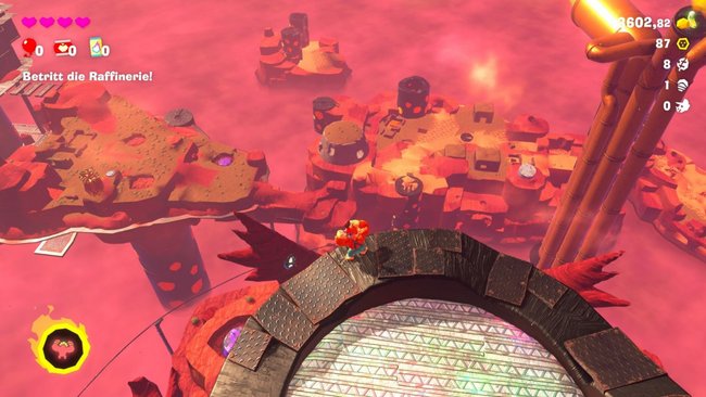Screenshot aus Donkey Kong Bananza mit Donkey Kong auf einem Turm, der auf die detailarme Landschaft unter ihm blickt. Screenshot aus Donkey Kong Bananza mit Donkey Kong auf einem Turm, der auf die detailarme Landschaft unter ihm blickt.