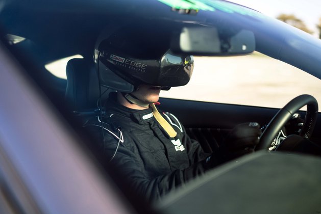 castrol-virtual-racers-matt-powers-behind-the-wheel-in-his-oculus-rift-headset castrol-virtual-racers-matt-powers-behind-the-wheel-in-his-oculus-rift-headset