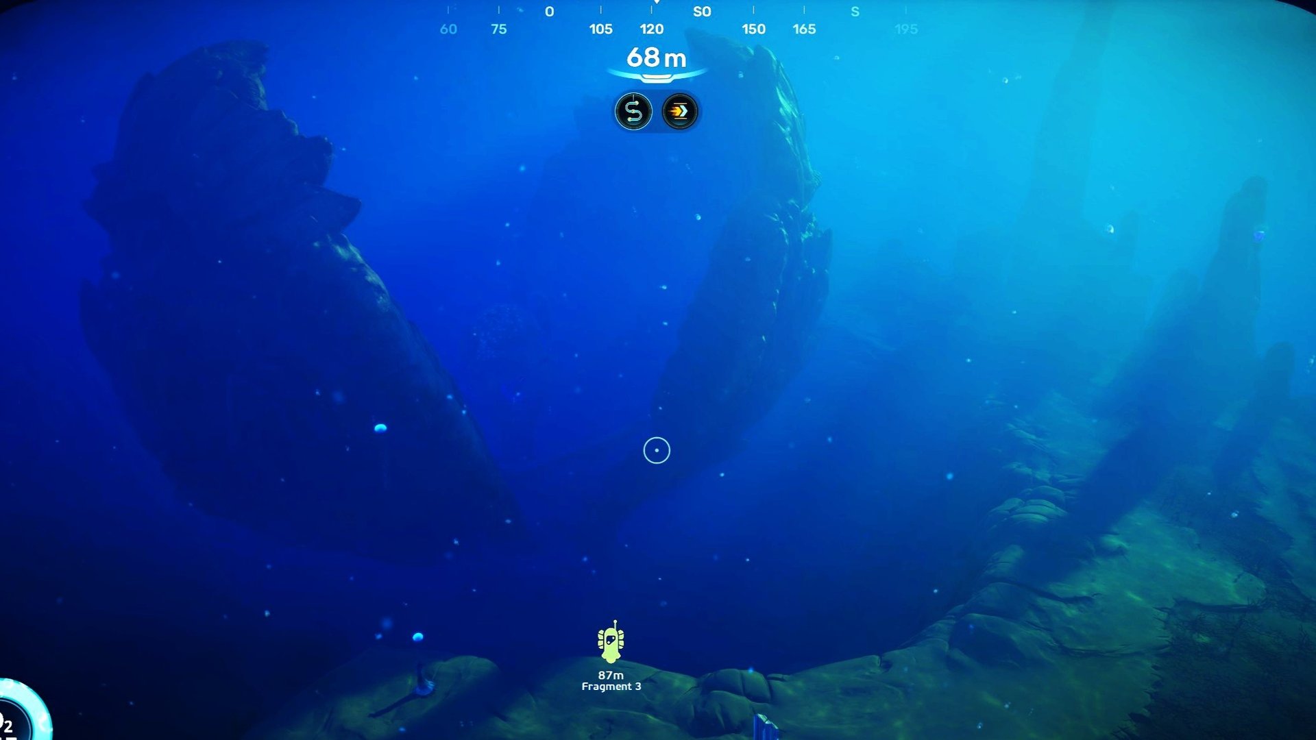 The third fragment is on the ground next to a giant clam.