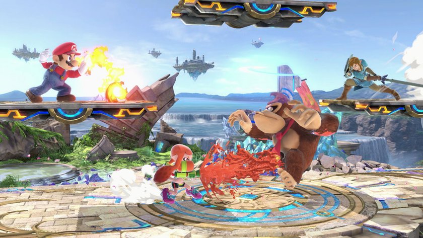 Screenshot aus Smash Bros. Ultimate mit Mario, Donkey Kong, und Link, die gegeneinander kämpfen.
