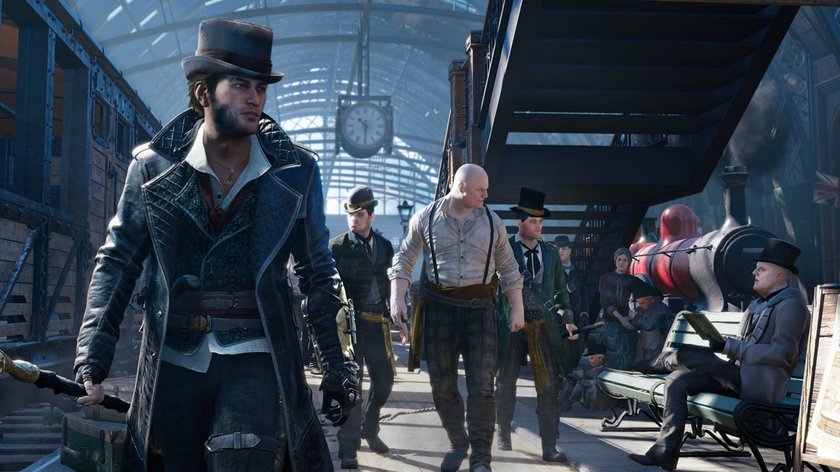 Das Bild zeigt Charaktere im Spiel Assassin's Creed Syndicate am Gleis eines Bahnhofs. Im Vordergrund ein Mann mit Zylinder neben einem Zug.