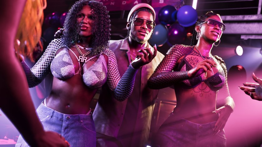 Dre'Quan Priest aus GTA 6 zwischen zwei Frauen in einem Club