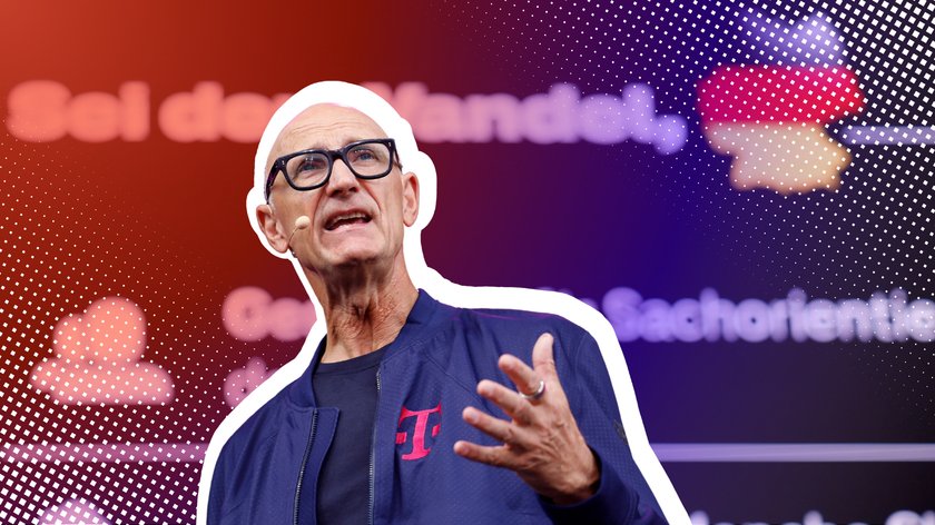 Telekom-Chef Tim Höttges in blauer Jacke mit Telekom-Logo.