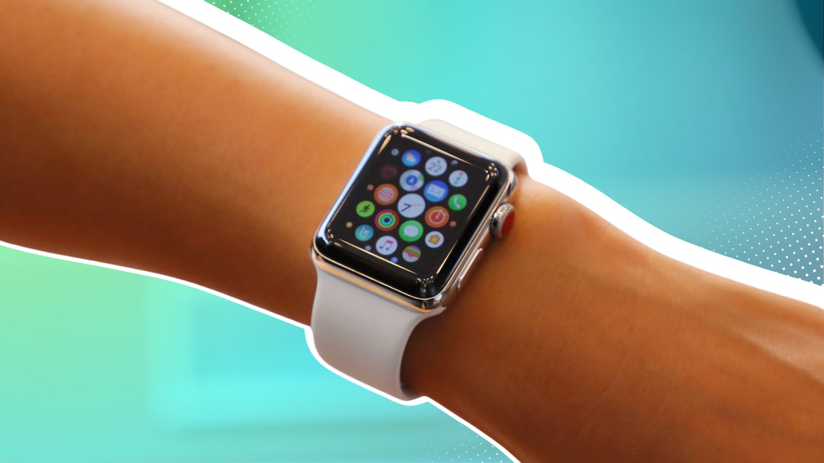 Das Bild zeigt einen Arm. Daran befindet sich eine Apple Watch mit weißem Band.