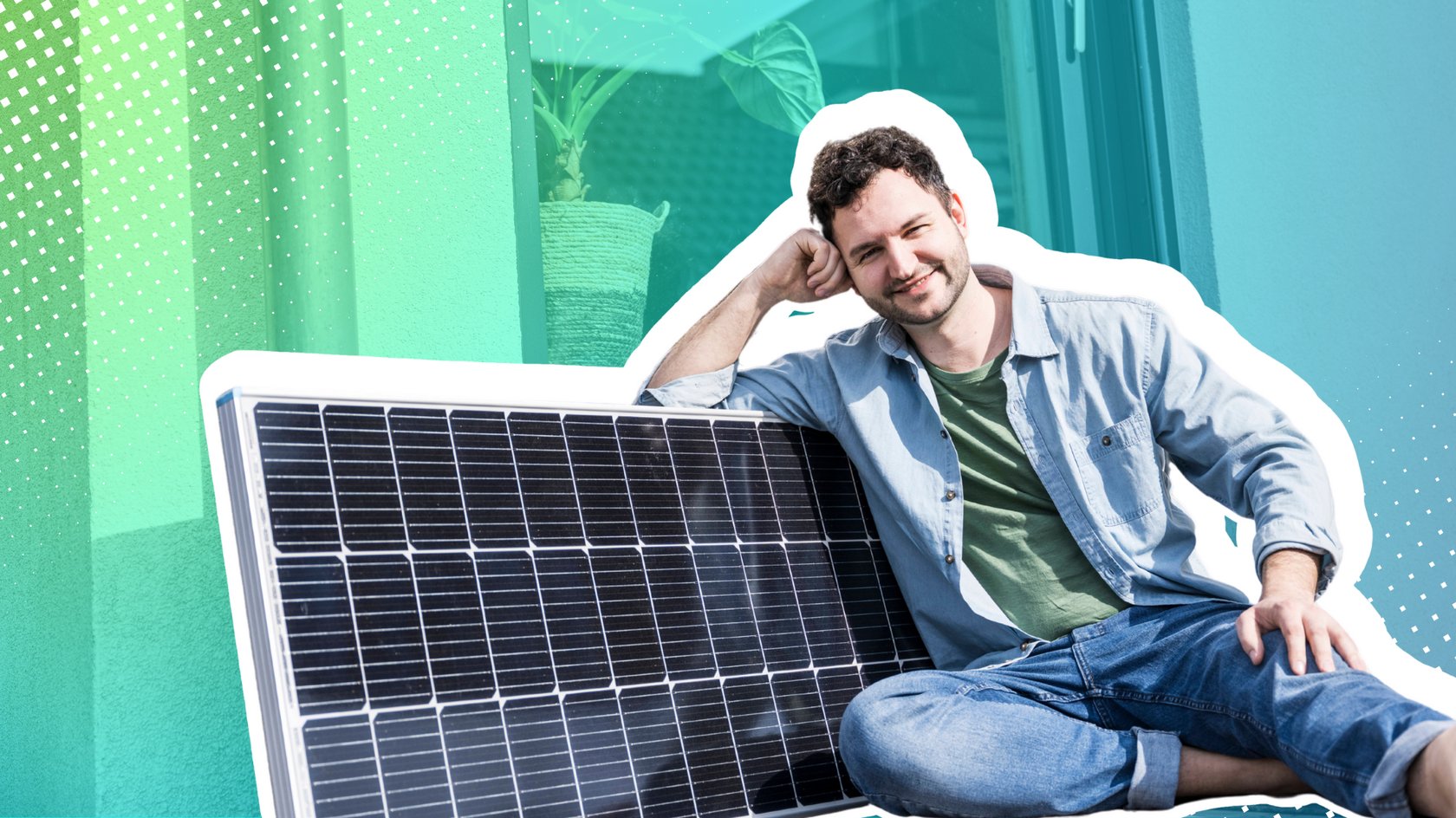 Mann mit Solar-Panel auf dem Balkon.