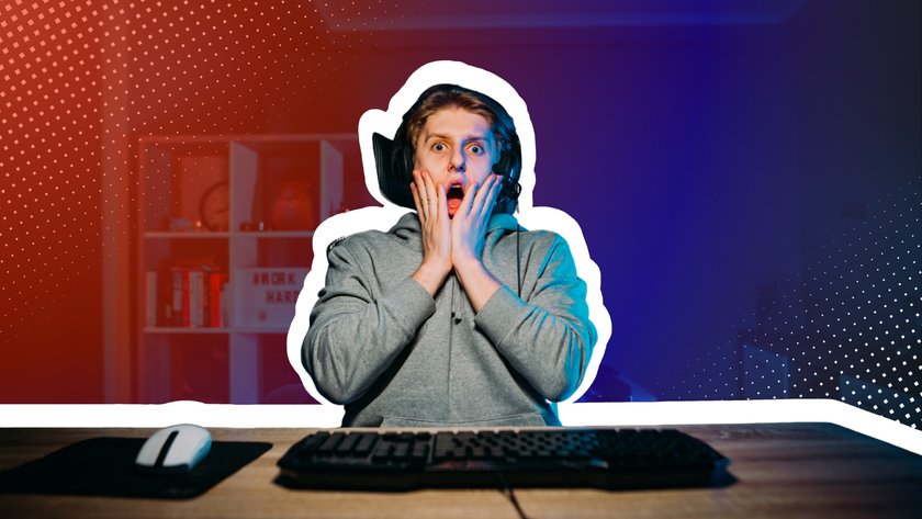 Junger Mann sitzt am PC und schaut schockiert.