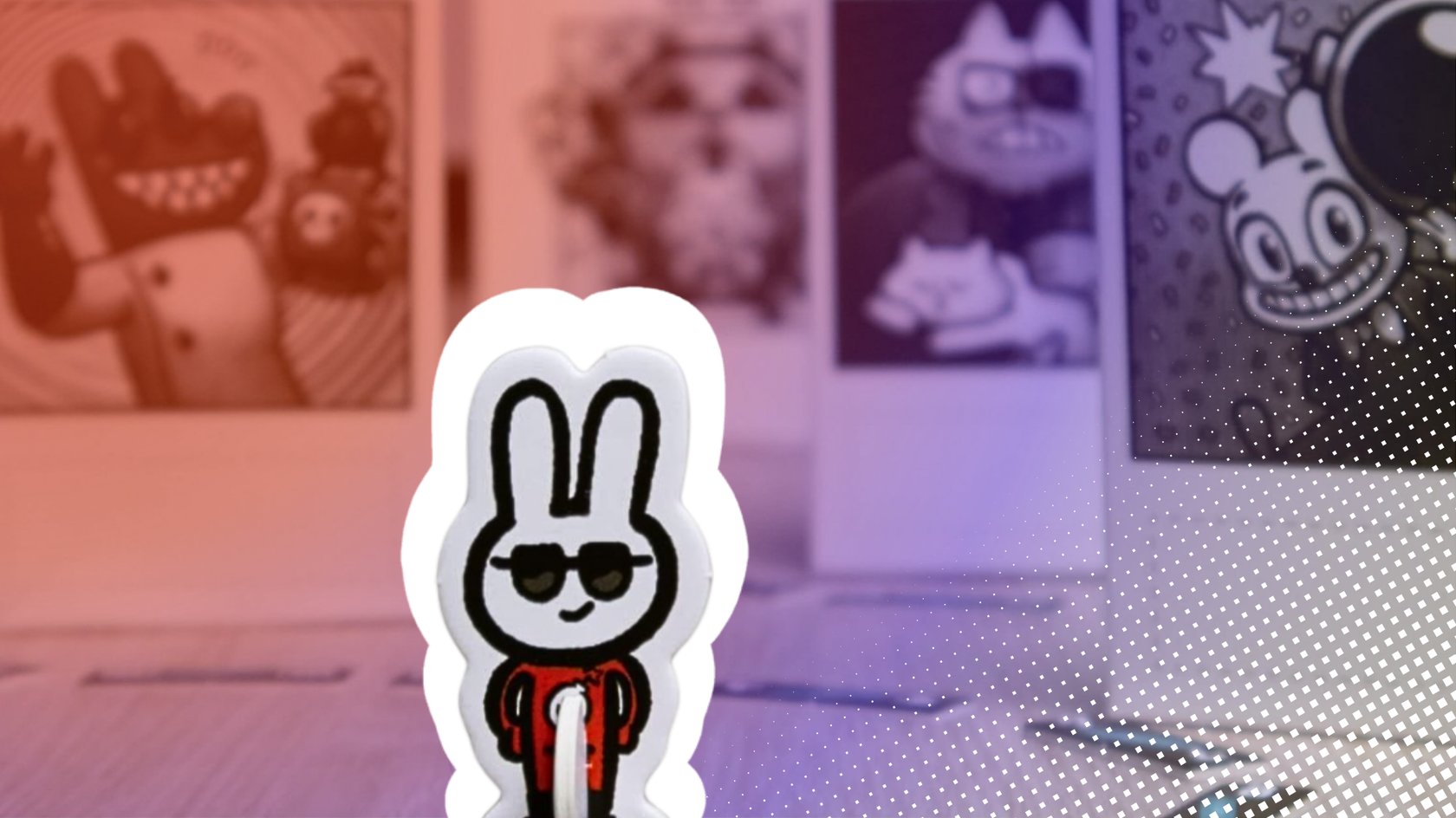 Ein Cartoon-Hase mit Sonnenbrille und roter Jacke steht vor Karten mit schwarz-weißen Comic-Illustrationen.