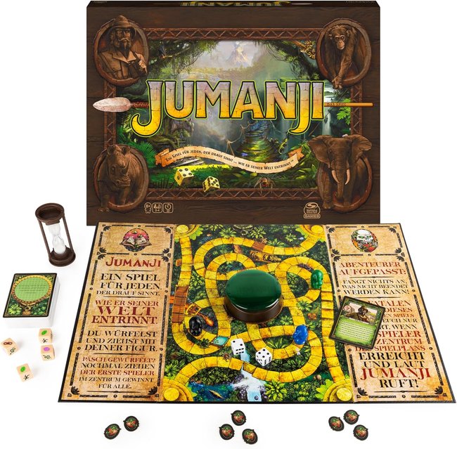 Das Brettspiel „Jumanji“ mit all seinen Inhalten: Von Verpackung über Würfel und Spielbrett bis grüne Kuppel.