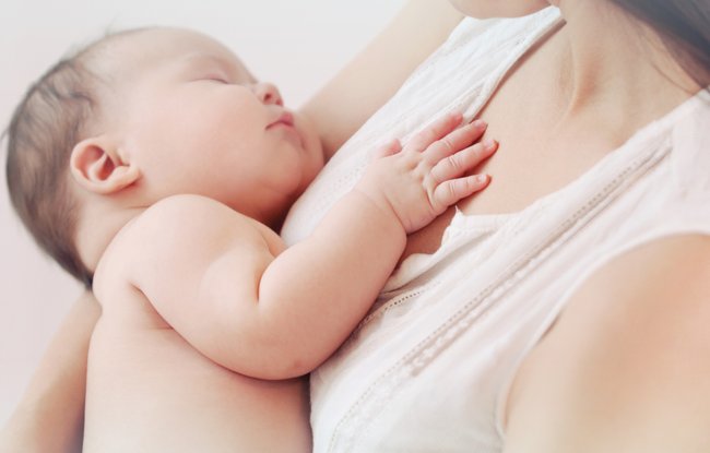mother and her newborn baby, maternity concept, soft image of beautiful family