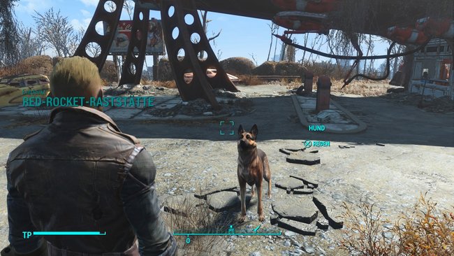 Bei der Tankstelle wartet Dogmeat bereits auf euch, der euch begleitet und dem ihr Befehle erteilen könnt (Bildquelle: Screenshot und Bearbeitung GIGA).