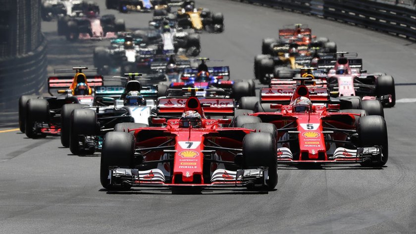 MONTE-CARLO, MONACO - MAY 28: Kimi Raikkonen of Finland driving the (7) Scuderia Ferrari SF70H leads Sebastian Vettel of Germany driving the (5) Scuderia Ferrari SF70H at the first corner during the Monaco Formula One Grand Prix at Circuit de Monaco on May 28, 2017 in Monte-Carlo, Monaco. (Photo by Mark Thompson/Getty Images)