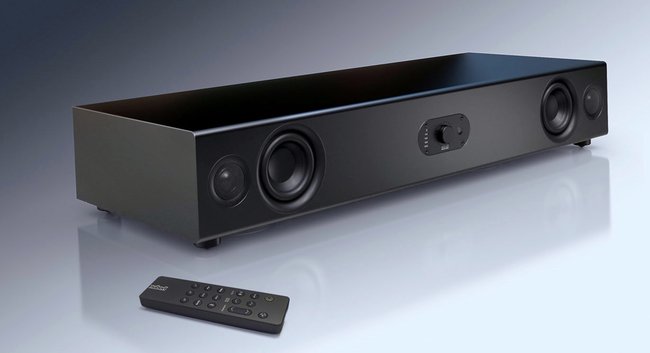 Eine schwarze Soundbar mit Fernbedienung, Modell Nubert nuPro AS-3500.