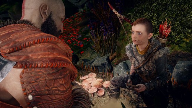 Kratos gibt Atreus sein Messer zurück, das er verloren hat. (Quelle: Screenshot spieletipps.de)