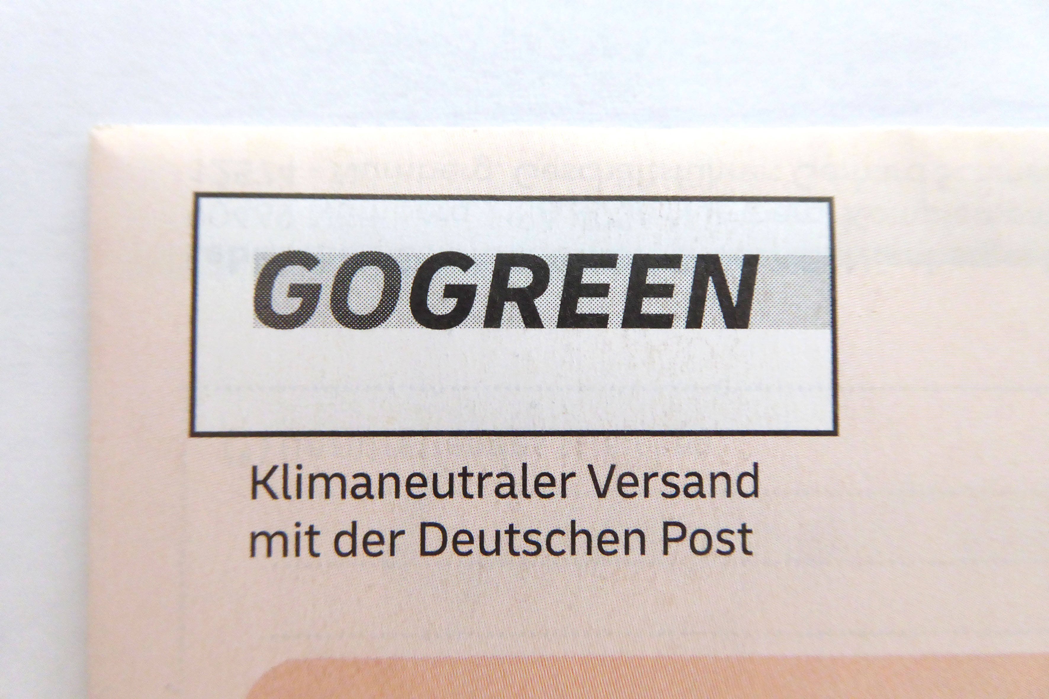 Was bedeutet GoGreen auf den deutschen Paketen?